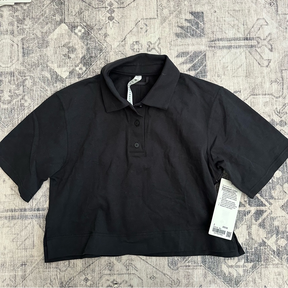 lululemon athletica Black Women's Polo Top size 2 (small)